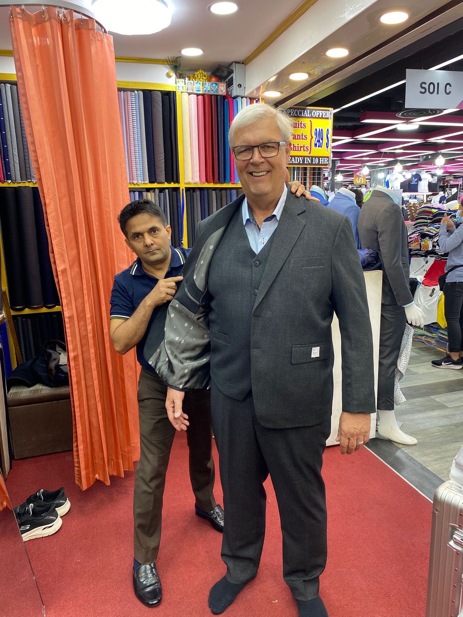 Happy client in custom tailored suit at King Fashion Uni Bangkok